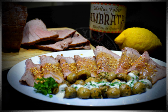 Arrosto speziato alla birra con champignon al forno